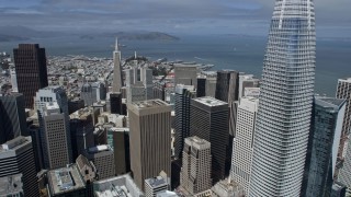 AX0175_0150 - 6K aerial stock footage of flying over Downtown San Francisco toward North Beach piers, California