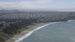AX0175_0179 - 6K aerial stock footage of the Outer Richmond District seen from Baker Beach, San Francisco, California
