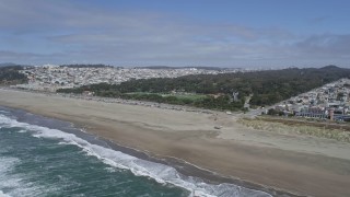 AX0175_0191 - 6K aerial stock footage of panning to Ocean Beach and Golden Gate Park from ocean, San Francisco, California