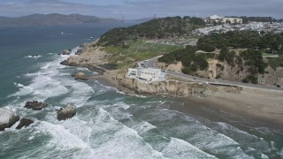 AX0175_0192 - 6K aerial stock footage of the Cliff House overlooking Seal Rocks and ocean, San Francisco, California