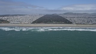 AX0175_0195 - 6K aerial stock footage of flying over Ocean Beach and Golden Gate Park, San Francisco, California