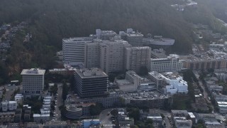 AX0175_0197 - 6K aerial stock footage of passing by a hospital in the Inner Sunset District, San Francisco, California