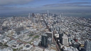 AX0175_0199 - 6K aerial stock footage of passing city hall on the way to downtown, San Francisco, California