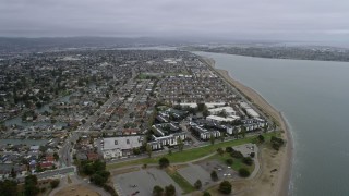 AX0175_0218 - 6K aerial stock footage of approaching waterfront neighborhoods in Alameda, California