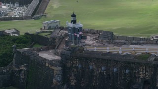 AX101_023 - 4.8K aerial stock footage of a Historic fort and lighthouse, Old San Juan Puerto Rico