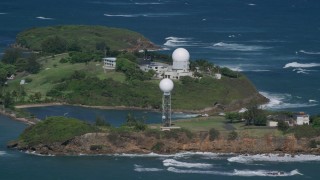 AX101_028 - 4.8K aerial stock footage of Punta Salinas Radar Site in the blue waters of the Caribbean, Toa Baja Puerto Rico