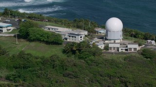 AX101_029 - 4.8K aerial stock footage of Punta Salinas Radar Site in the blue waters of the Caribbean, Toa Baja Puerto Rico