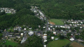 AX101_037E - 4.8K aerial stock footage of Rural homes set among forests and farmland, Vega Alta, Puerto Rico