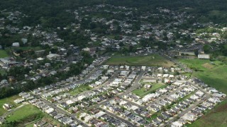 AX101_044E - 4.8K aerial stock footage Fly over residential neighborhoods, Morovis, Puerto Rico