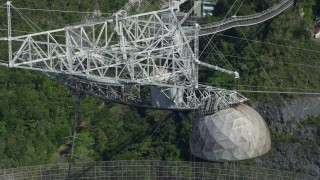 AX101_100E - 4.8K aerial stock footage Orbiting the tope of Arecibo Observatory, Puerto Rico