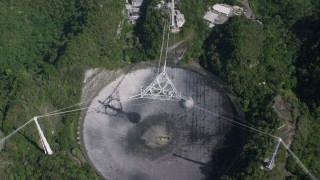 AX101_122 - 4.8K aerial stock footage Orbiting above Arecibo Observatory, Puerto Rico 