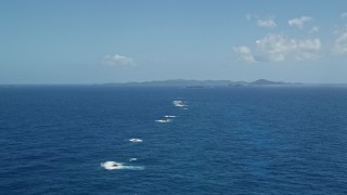 AX102_097E - 4.8K aerial stock footage of tiny islands in sapphire blue ocean water, Culebra, Puerto Rico