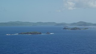 AX102_101 - 4.8K aerial stock footage of a Cluster of islands in sapphire blue waters, Culebra, Puerto Rico 