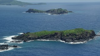 AX102_102E - 4.8K aerial stock footage of a Cluster of islands in sapphire blue waters, Culebra, Puerto Rico