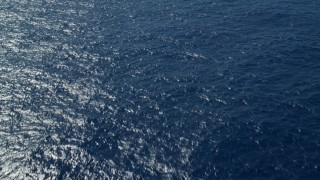 AX102_192 - 4.8K stock footage aerial video of Sapphire blue ocean waters, Atlantic Ocean