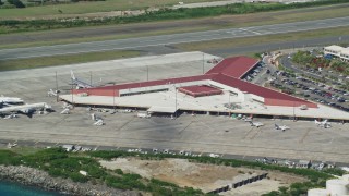 AX102_196E - 4.8K aerial stock footage of the main terminal at Cyril E King Airport, St. Thomas