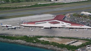 AX102_197 - 4.8K aerial stock footage of the Main terminal at Cyril E King Airport, St. Thomas 