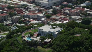 AX102_217 - 4.8K aerial stock footage Orbiting the Governor's Mansion, Charlotte Amalie 