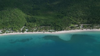 AX102_269 - 4.8K aerial stock footage of White sand Caribbean beach and turquoise blue waters, Magens Bay, St Thomas