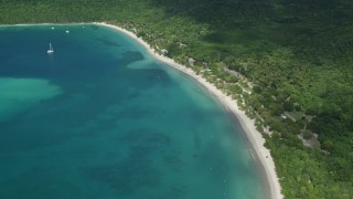 AX102_269E - 4.8K aerial stock footage of white sand Caribbean beach and turquoise blue waters, Magens Bay, St Thomas