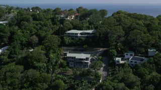 AX102_295 - 4.8K aerial stock footage Reveal coastal town and Caribbean blue waters, Northside, Charlotte Amalie
