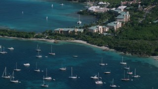 AX103_015 - 4.8K aerial stock footage of The Ritz-Carlton and turquoise blue Caribbean waters, St Thomas