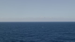 AX103_085 - 4.8K stock footage aerial video of Sapphire blue ocean waters, Atlantic Ocean
