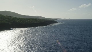 AX103_096 - 4.8K aerial stock footage of the Island coast along sapphire blue Caribbean waters, Culebra, Puerto Rico