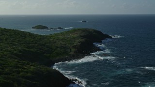 AX103_098E - 4.8K aerial stock footage of the island's coast along Caribbean blue waters, Culebra, Puerto Rico