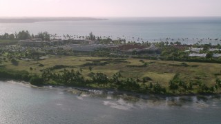 AX103_129 - 4.8K aerial stock footage of Gran Melia Golf Resort with views of Caribbean blue waters, Puerto Rico