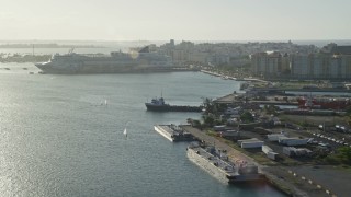 AX103_153 - 4.8K aerial stock footage of a Docked cruise ship in Port of San Juan, Puerto Rico