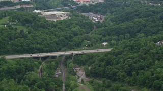 AX105_002 - 4.8K aerial stock footage approaching Penn Lincoln Parkway and tilting down, Penn Hills, Pennsylvania