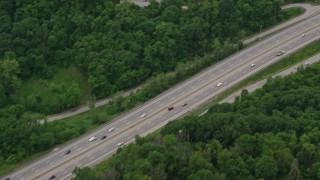 AX105_003 - 4.8K aerial stock footage tilting up Penn Lincoln Parkway, Penn Hills, Pennsylvania