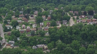 AX105_006 - 4.8K aerial stock footage of a suburban neighborhood, Turtle Creek, Pennsylvania