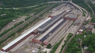 AX105_007 - 4.8K aerial stock footage flying over a factory, Turtle Creek, Pennsylvania