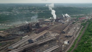 AX105_010 - 4.8K aerial stock footage of U.S. Steel Mon Valley Works Steel Mill, Braddock, Pennsylvania