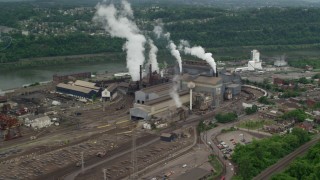 AX105_012 - 4.8K aerial stock footage of U.S. Steel Mon Valley Works Factory, Braddock, Pennsylvania