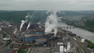 AX105_013 - 4.8K aerial stock footage orbiting U.S. Steel Mon Valley Works Factory, Braddock, Pennsylvania