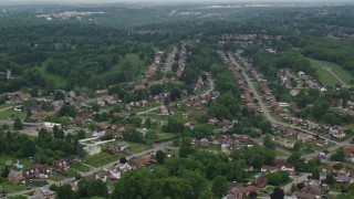 AX105_015E - 4.8K aerial stock footage flying over Suburban Neighborhoods, West Mifflin, Pennsylvania