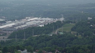 AX105_020 - 4.8K aerial stock footage of a large factory, West Mifflin, Pennsylvania