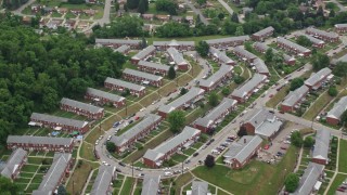 AX105_025 - 4.8K aerial stock footage flying over row houses, Munhall, Pennsylvania