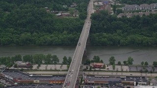 AX105_028 - 4.8K aerial stock footage orbiting Homestead Grays Bridge, Pittsburgh, Pennsylvania