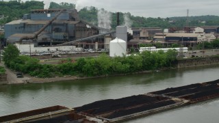 AX105_054 - 4.8K aerial stock footage of U.S. Steel Mon Valley Works Factory, Braddock, Pennsylvania