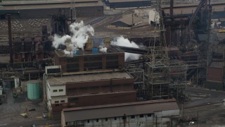 AX105_057 - 4.8K aerial stock footage of U.S. Steel Mon Valley Works Factory, Braddock, Pennsylvania