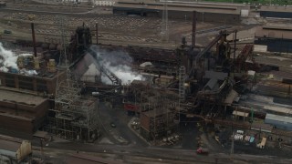 AX105_058 - 4.8K aerial stock footage orbiting U.S. Steel Mon Valley Works Factory, Braddock, Pennsylvania