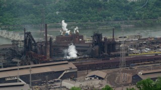 AX105_067 - 4.8K aerial stock footage of U.S. Steel Mon Valley Works Factory, Braddock, Pennsylvania