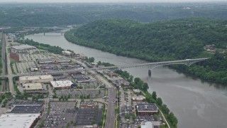 AX105_073E - 4.8K aerial stock footage of a shopping mall and Homestead Grays Bridge, Pittsburgh, Pennsylvania