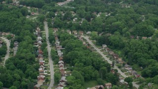 AX105_089 - 4.8K aerial stock footage of suburban neighborhoods, Penn Hills, Pennsylvania