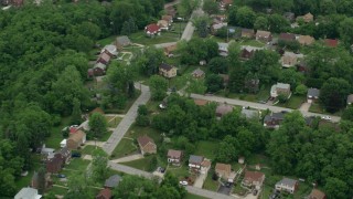 AX105_090 - 4.8K aerial stock footage of suburban homes and quiet streets, Penn Hills, Pennsylvania