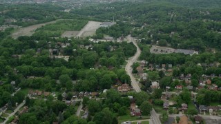 AX105_099 - 4.8K aerial stock footage flying over suburban neighborhood, Penn Hills, Pennsylvania